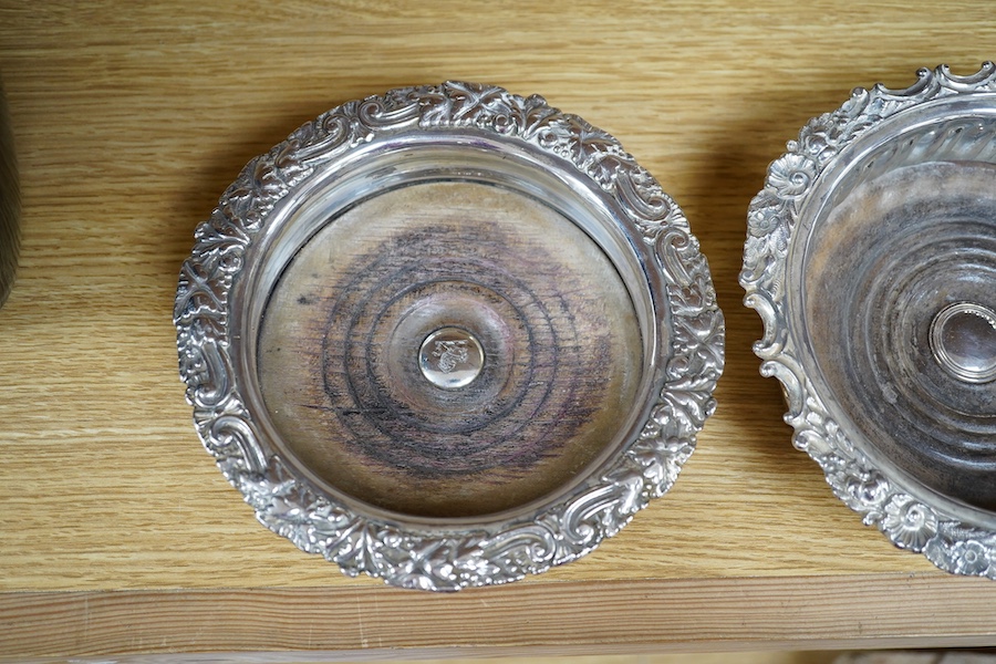 Two Old Sheffield plate wine coasters, 17cm. Condition - fair